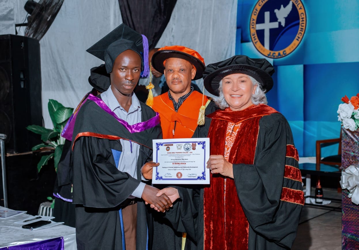 A graduate receiving a certificate at convocation